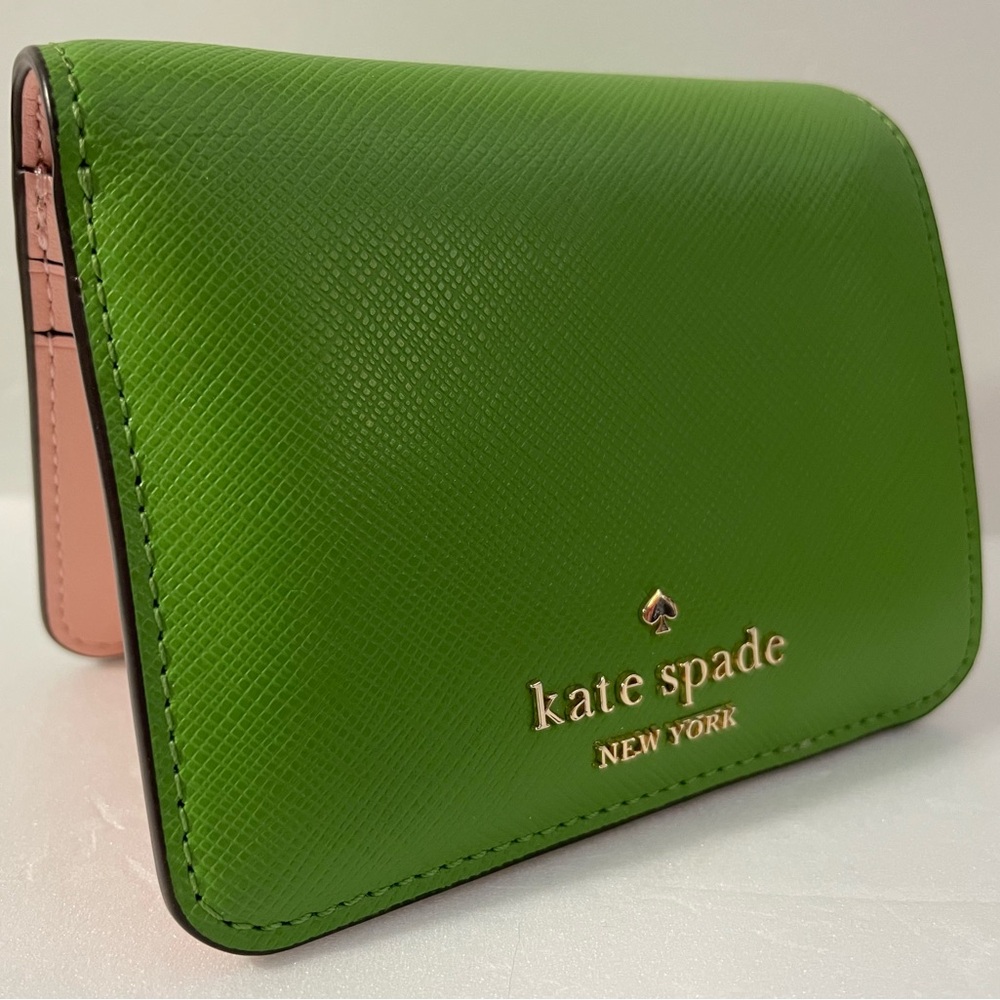 Kate Spade Light Green Small Bifold Wallet.  Pink inside.  Good snap closure